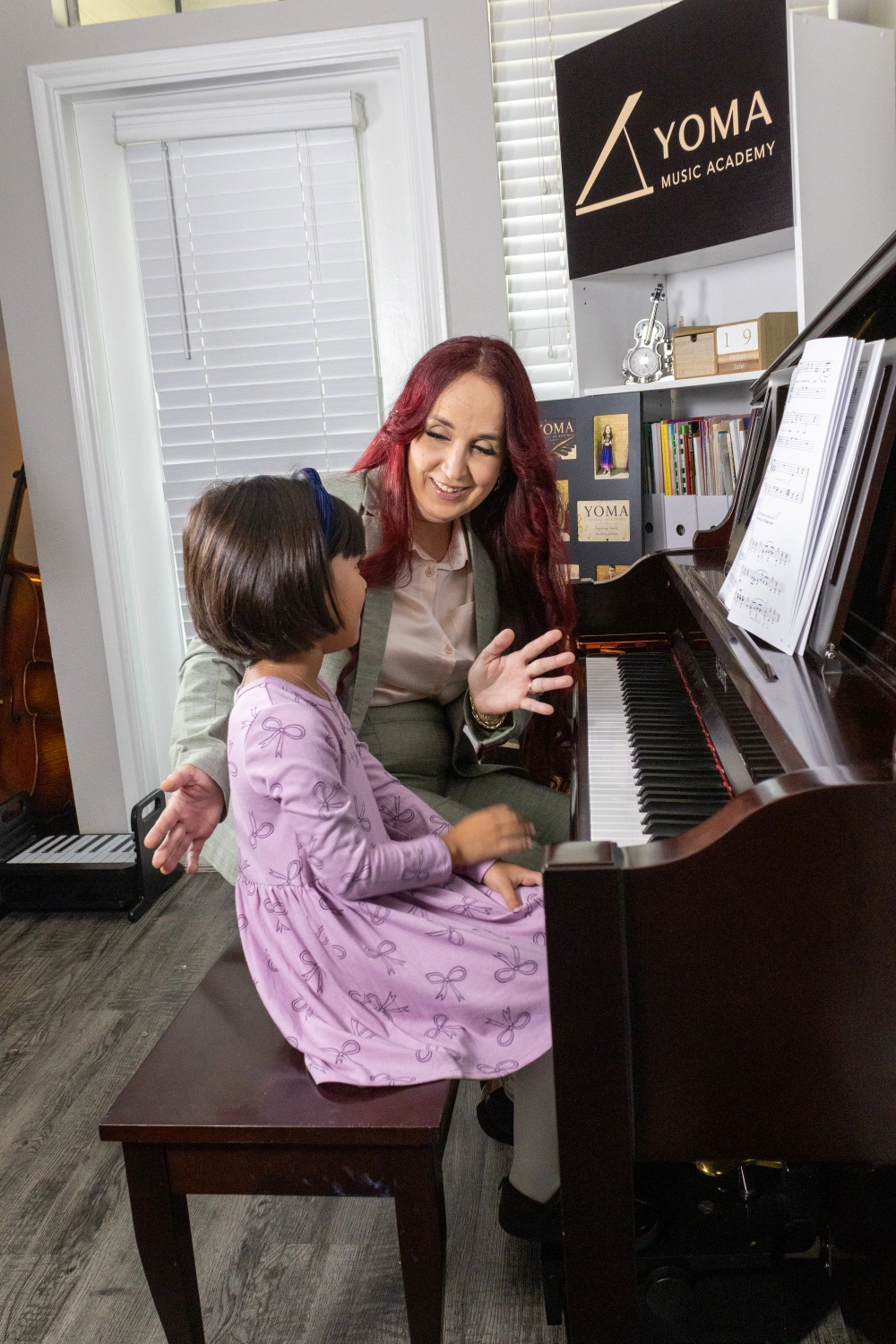 Girl learning piano at YOMA Music Academy